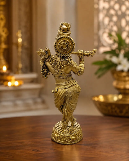 Closeup of detailed flute and crown on Brass Krishna Idol