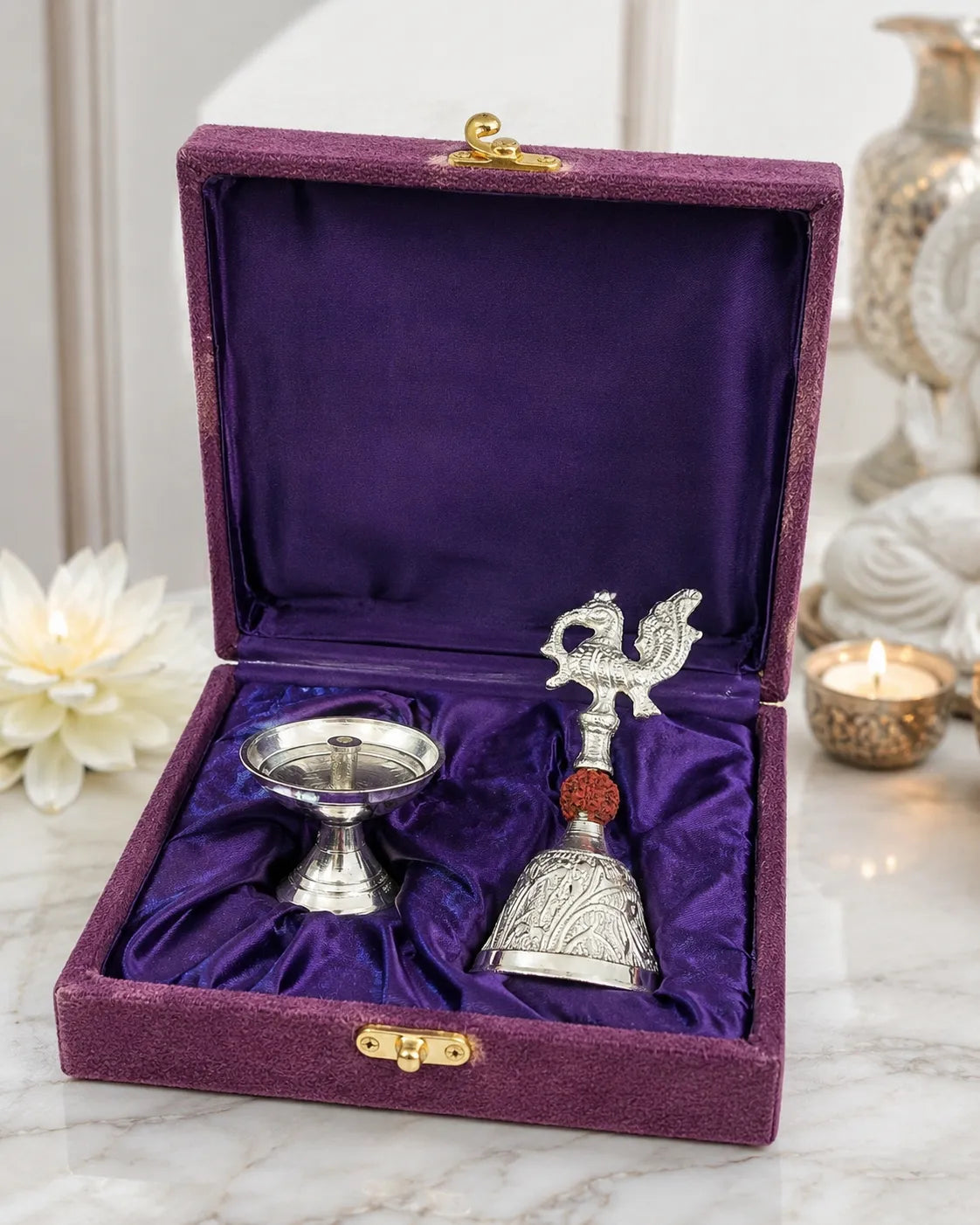 Closeup of ornate German Silver Ghanti with bird design