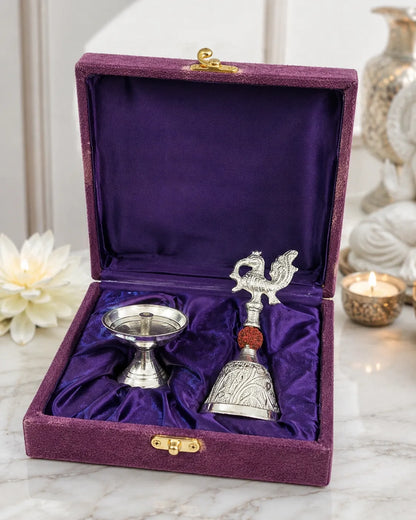 Closeup of ornate German Silver Ghanti with bird design