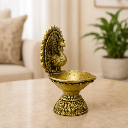Side view of Peacock Brass Diya with detailed peacock design